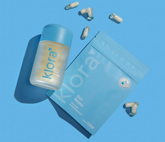 Klora Gut-Renew prebiotic and postbiotic refillable jar and refill pill pack with capsules on blue background