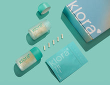 klora vegan bloat-digest subscription box with refillable jar and pill back